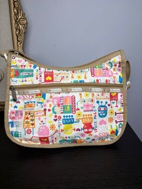 LeSportsac Multicolor Robot Love Print Crossbody with Tan Trim
